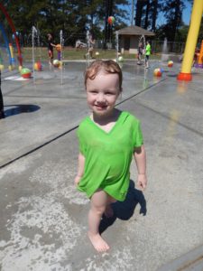 Presleigh Smith, 3, appears to fully approve of the new Splash Park.