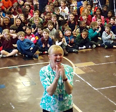 PE Teacher Bonnie Richardson learning she was just name Project Fit America's 2014 Teacher of the Year.