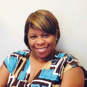 BCBS Foundation 16 women paving member Aisha Johnson.