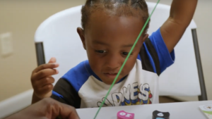 Child playing with toys.
