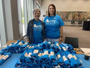 Blue Cross Blue Shield Foundation volunteers with Love on the Boot.