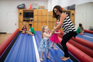 blue cross blue shield foundation volunteer playing with child